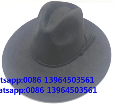 Czarny wełniany kapelusz typu fedora, kowbojski kapelusz